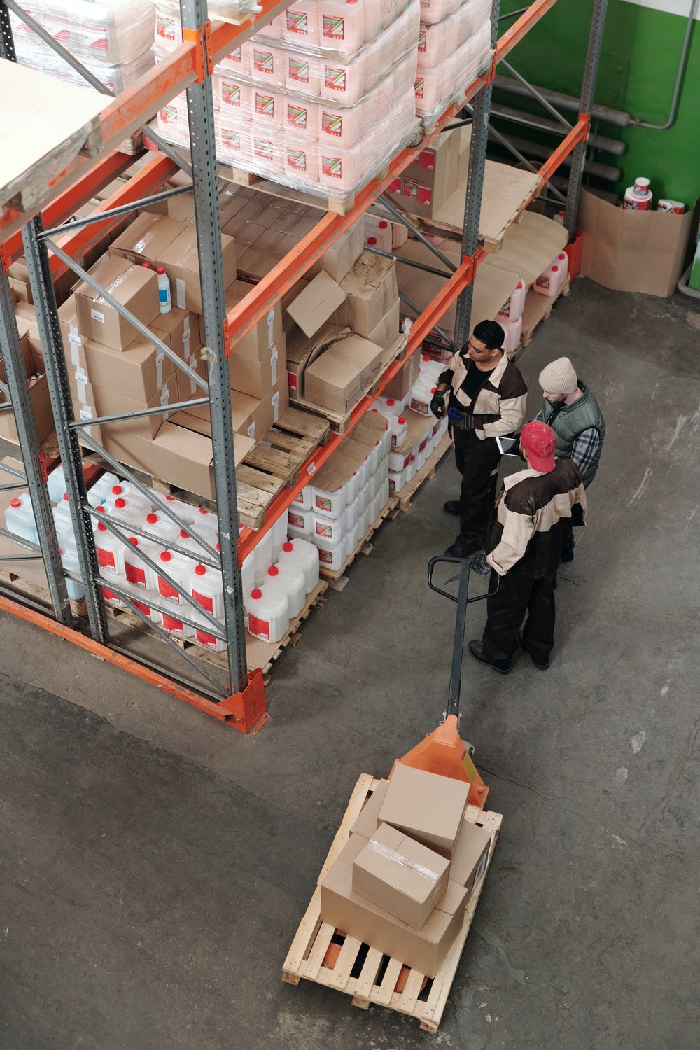 people standing in warehouse